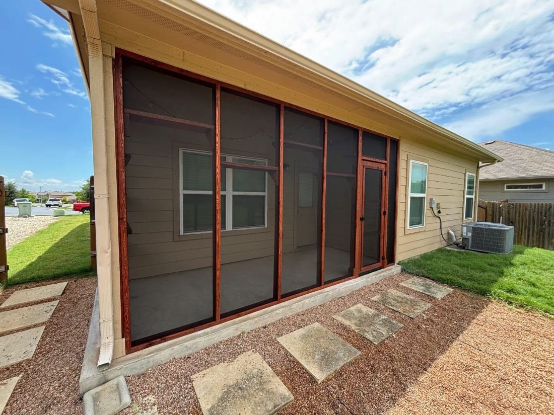 Finished cedar screened room on an Austin deck